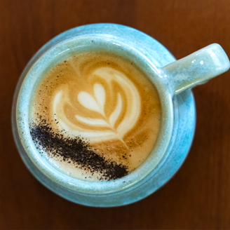 A cup of coffee with latte art.